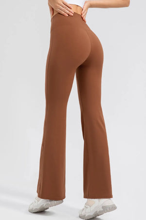 Back view displaying clean seam lines, wide waistband, and bootcut leg shape