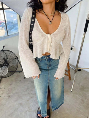 (Sleeve detail of ruffled hem tie-front cropped cardigan)