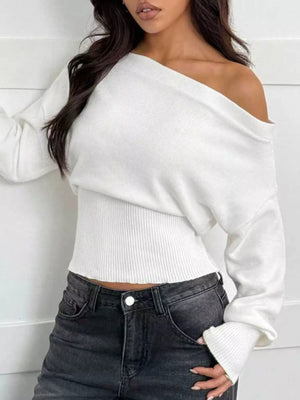 Side view of one shoulder cropped sweater