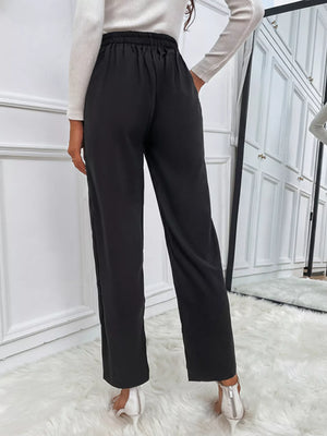 (Styled look of high waist wide leg pants front view)
