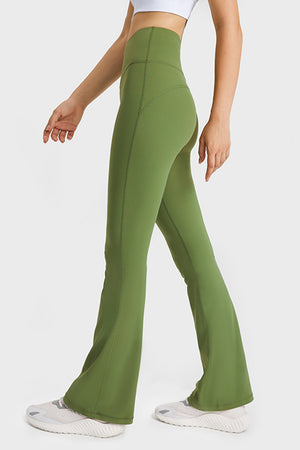 side view showing the flared leg movement and natural drape of the yoga pants