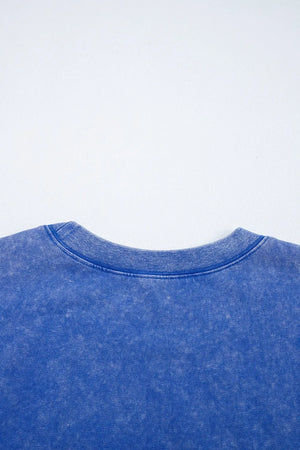 Detail of acid wash rolled trim top and pants set