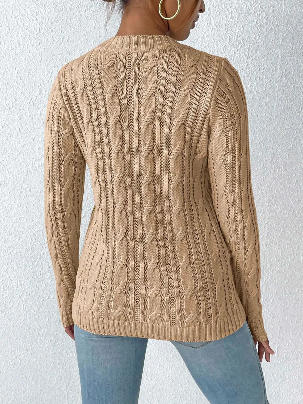 Back view of cable knit round neck sweater warm women knitwear