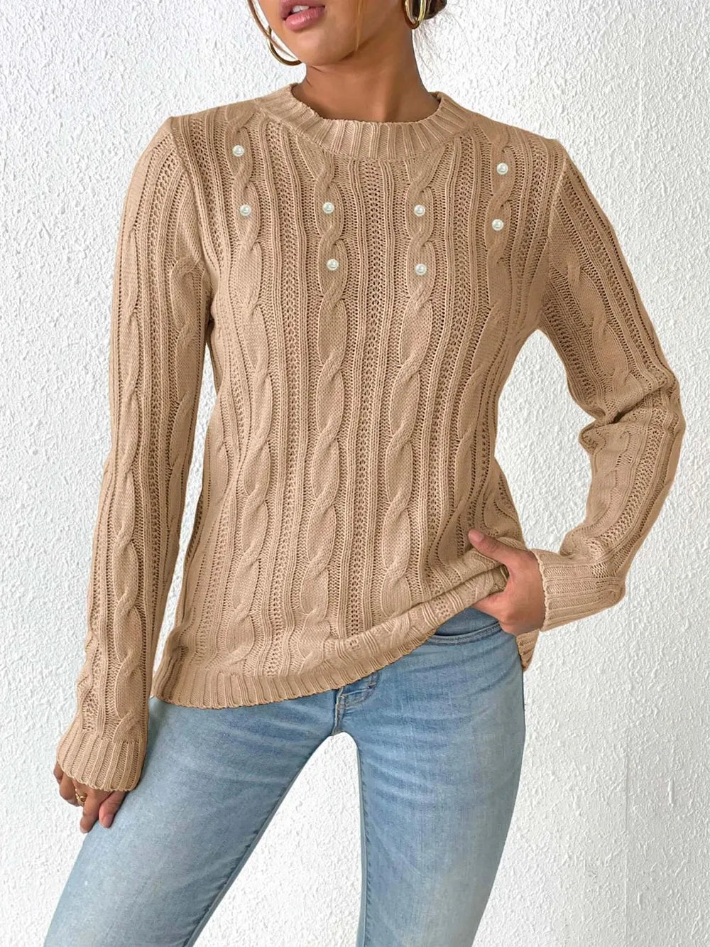 Cable knit round neck long sleeve sweater front view cozy winter outfit
