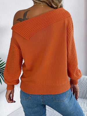 Back detail of cable knit one shoulder sweater lightweight knitwear