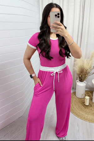 Front full look of contrast trim round neck top and pants set