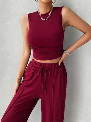 Front view of Devine sleeveless top with drawstring pants