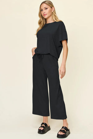 Side angle of Double Take round neck t-shirt and pants set