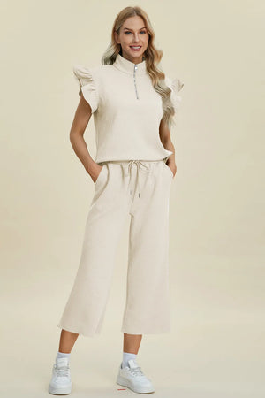 Front view of Double Take textured ruffle short sleeve top and wide leg pants set