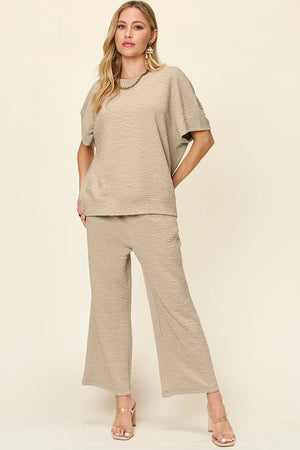 Front view of Double Take textured short sleeve top and pants set