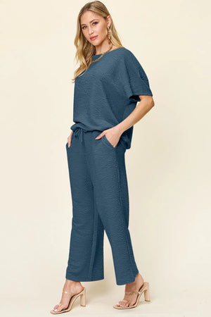 Side view of Double Take textured short sleeve pants outfit