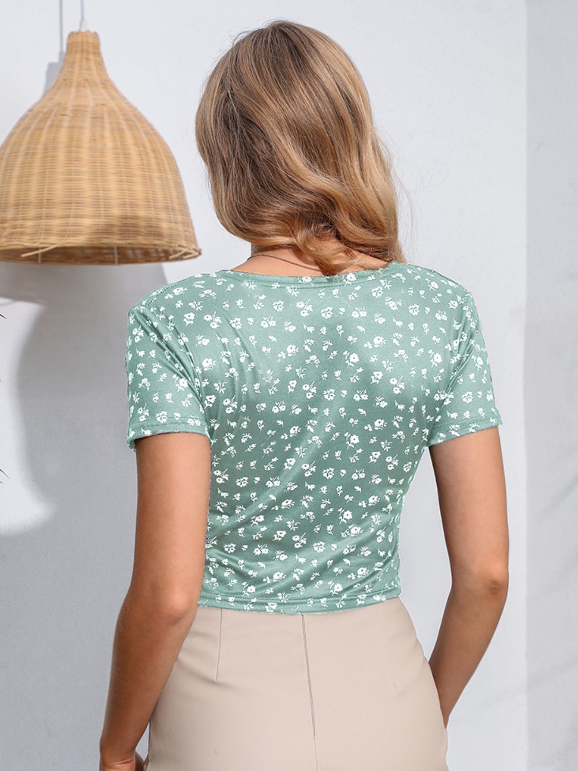 Floral surplice neck short sleeve top back view