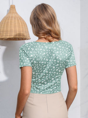 Floral surplice neck short sleeve top back view