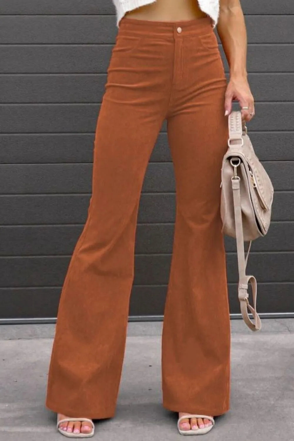 Front view showing high waist and bootcut fit