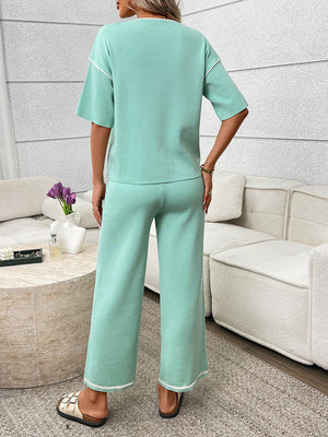 Back view of round neck half sleeve top and pants set