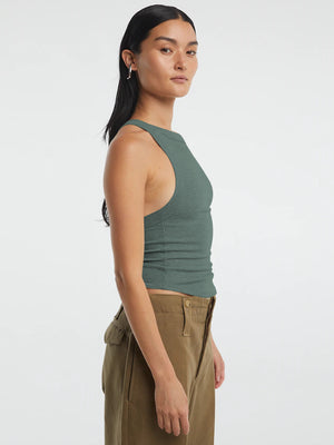 Side view showing flattering fit and halter straps