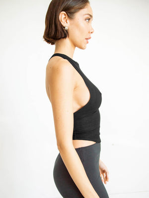 Side angle showing top’s silhouette and fit