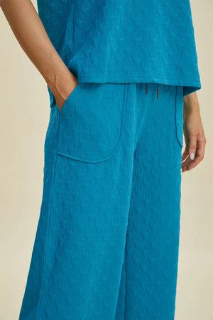 Side showcasing texture and overall design flow