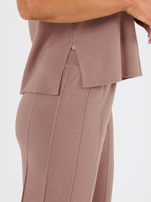 Side view of cap sleeve top and pants knit set