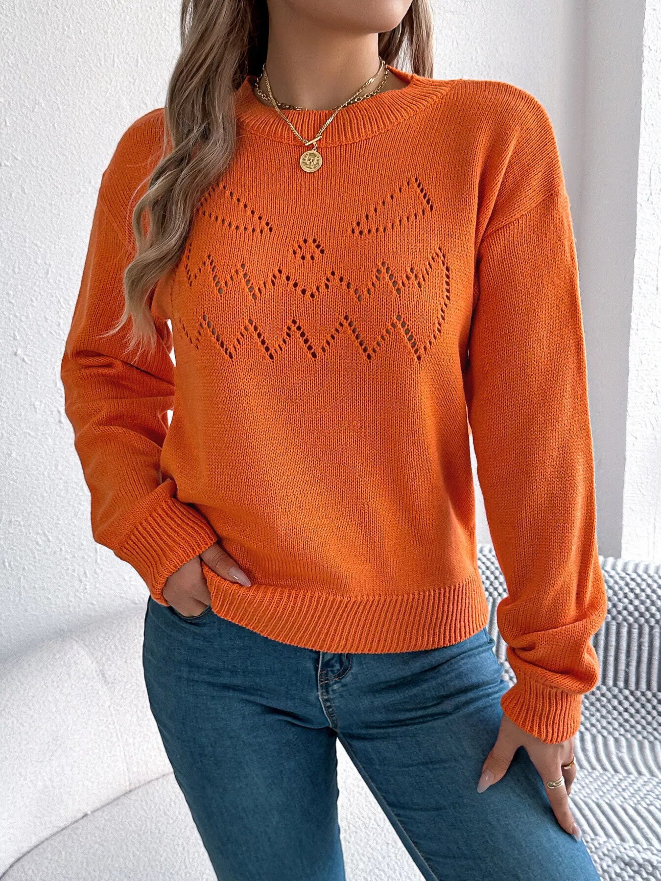 Front view of openwork round neck long sleeve sweater stylish knit design