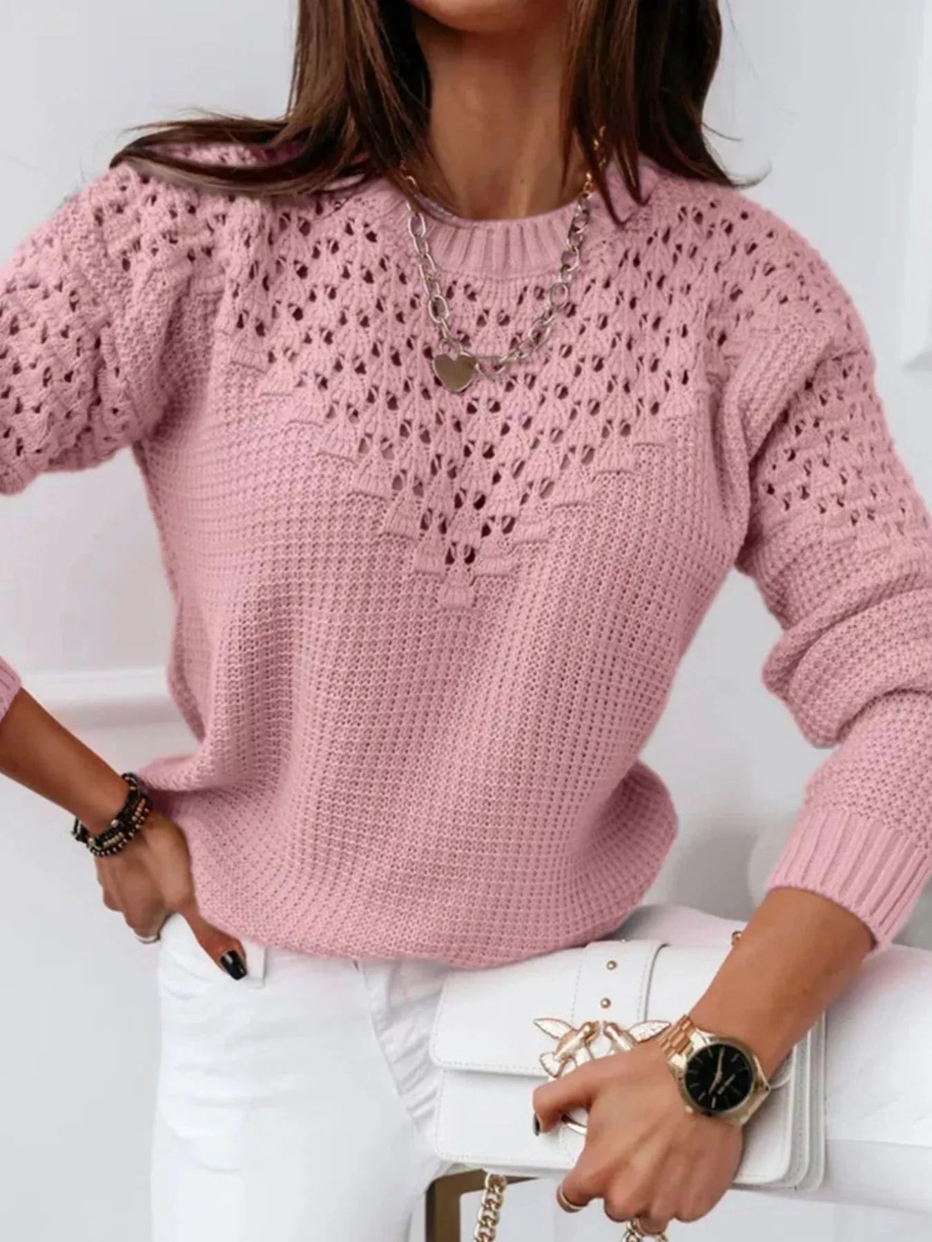 Front view of textured openwork round neck sweater with elegant knit pattern
