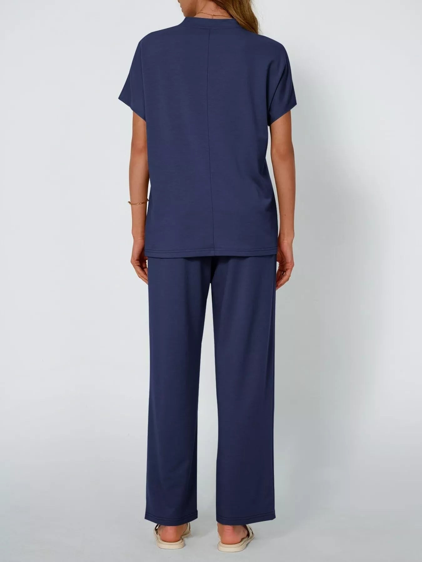 Back view of plus size round neck short sleeve top and pants set