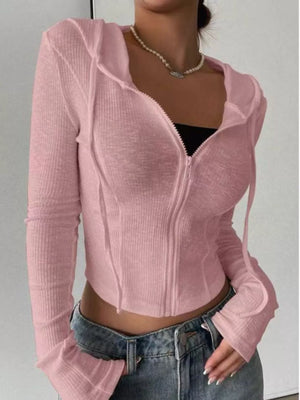 Three-quarter view of ribbed knit cropped jacket