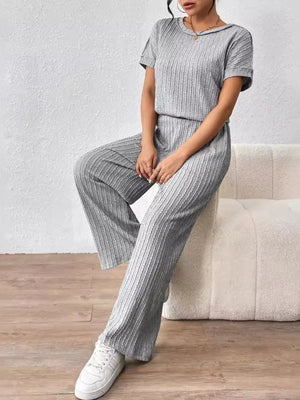 Round neck short sleeve top and pants set viewed at an angled base