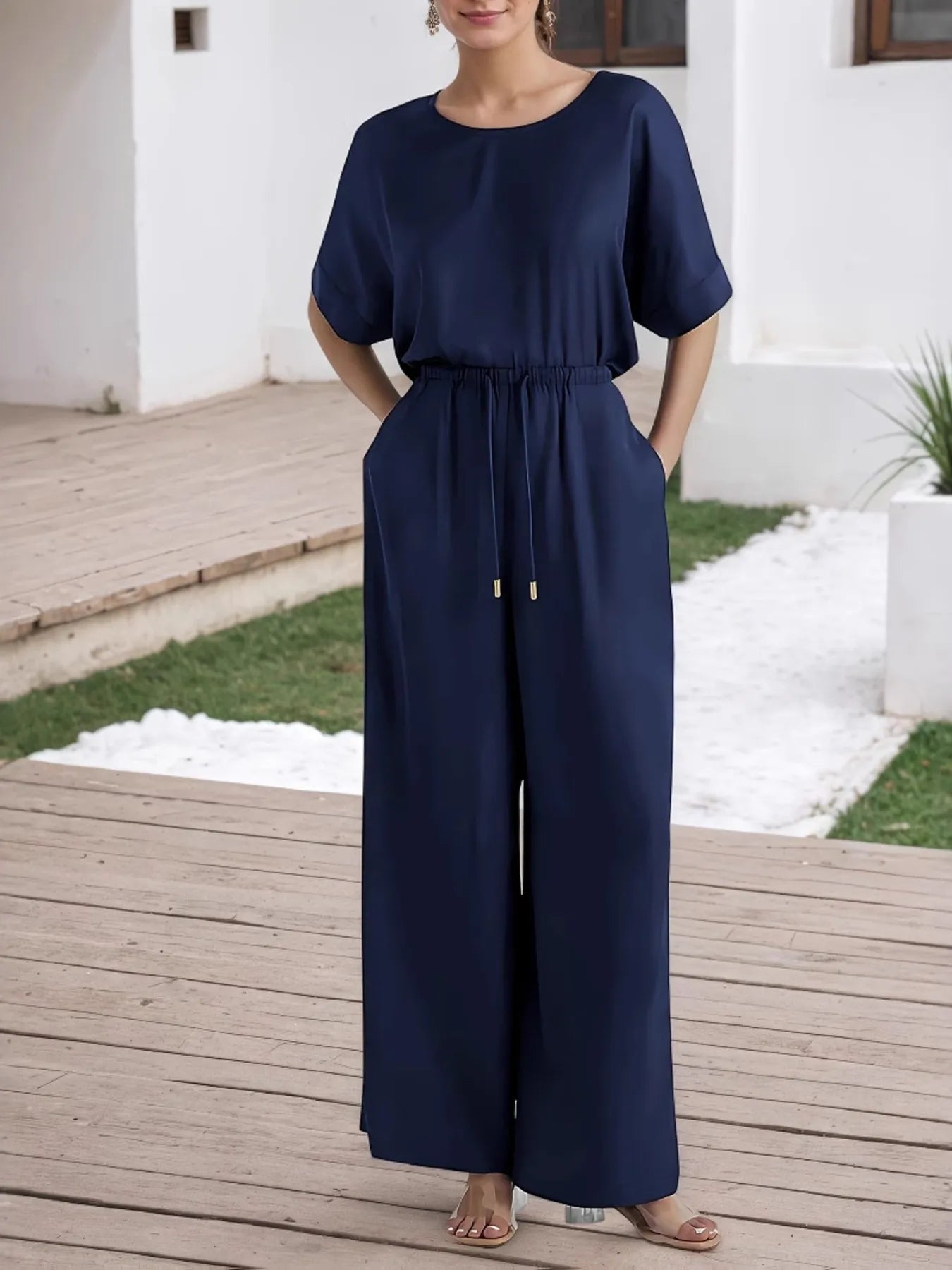 Stylish front look of round neck top and pants set
