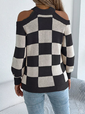 Back view of checkered cold shoulder sweater design