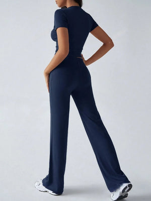 Back full look of round neck short sleeve top and pants set