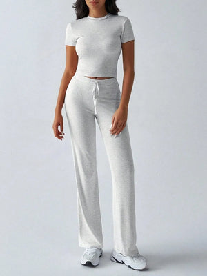 Front angle view of round neck short sleeve top and pants set