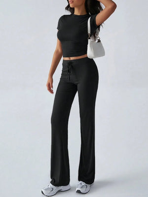 Front full look of round neck short sleeve top and pants set