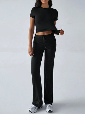 Front styling view of round neck short sleeve top and pants set