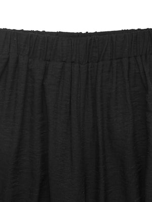 Flat lay view of sleeveless pants set