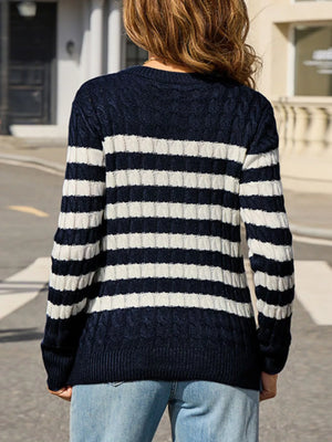 back side of striped cable knit sweater winter wear