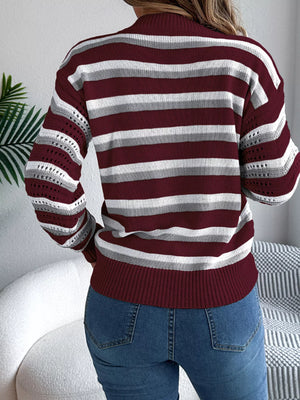 Rear view of striped round neck long sleeve knit sweater