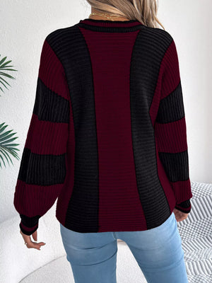 Back side of color block round neck sweater
