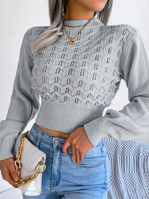 Side view of openwork mock neck cropped sweater