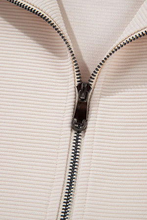 Full layout of textured ruffled sleeve top and pants set