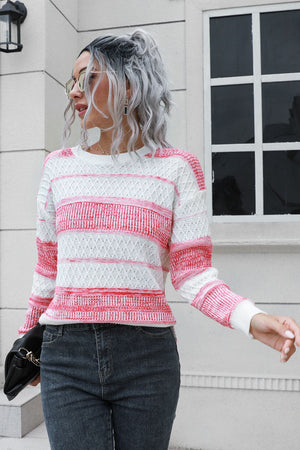 Front view of two-tone slit sweater design