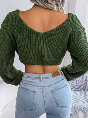 Back view of twisted front cropped sweater