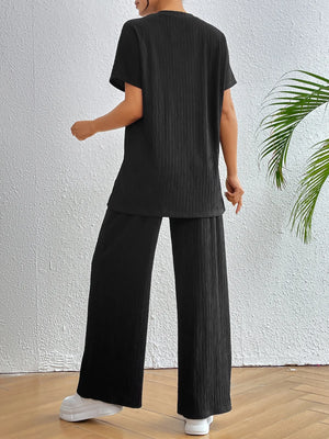 Back view of V-neck short sleeve top and pants set for women
