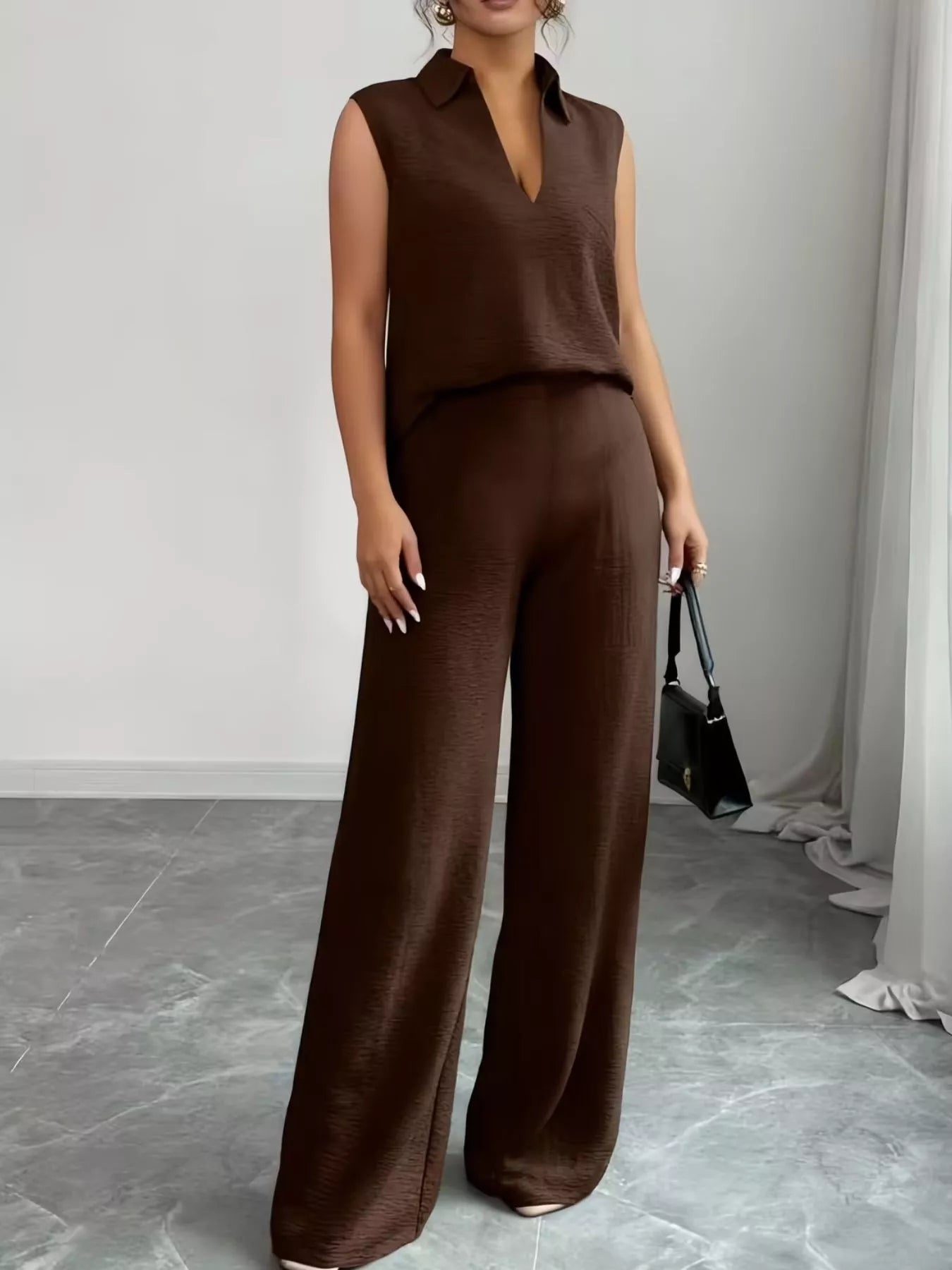 stylish sleeveless top with wide leg pants front look