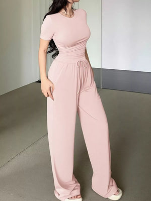 Side view of round neck T-shirt and pants set