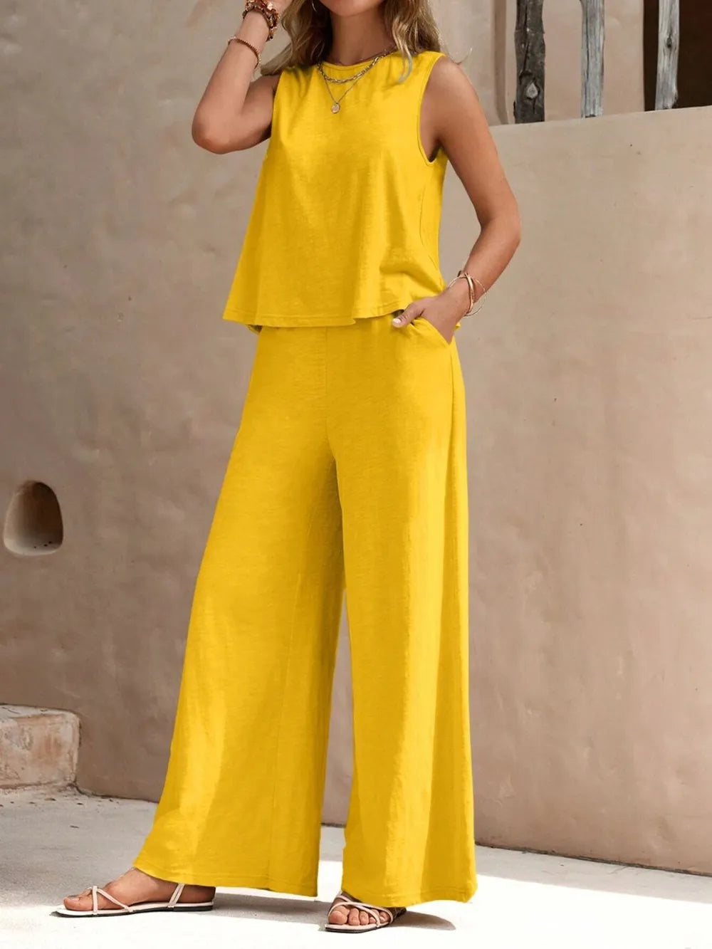 Detail of round neck sleeveless top and wide leg pants set