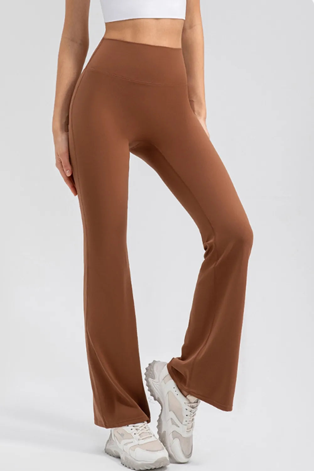 Front view with slight tilt emphasizing high waist support and stretch comfort