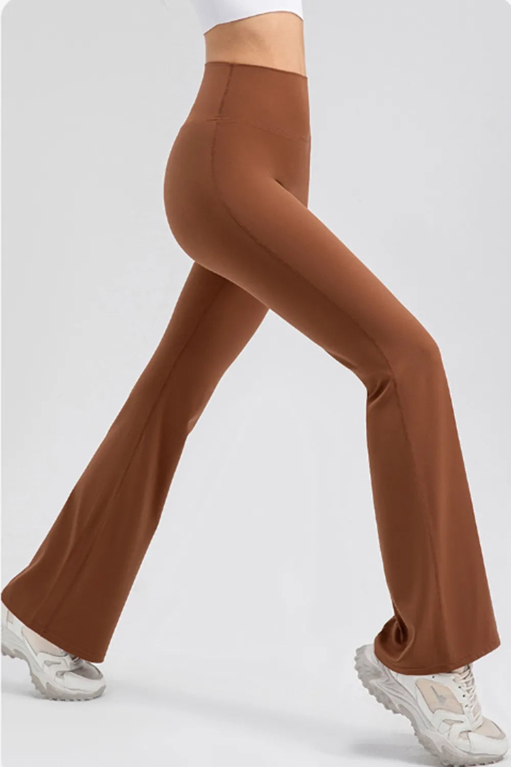 Side view showing bootcut flare from knee to ankle and smooth fit along hips and thighs