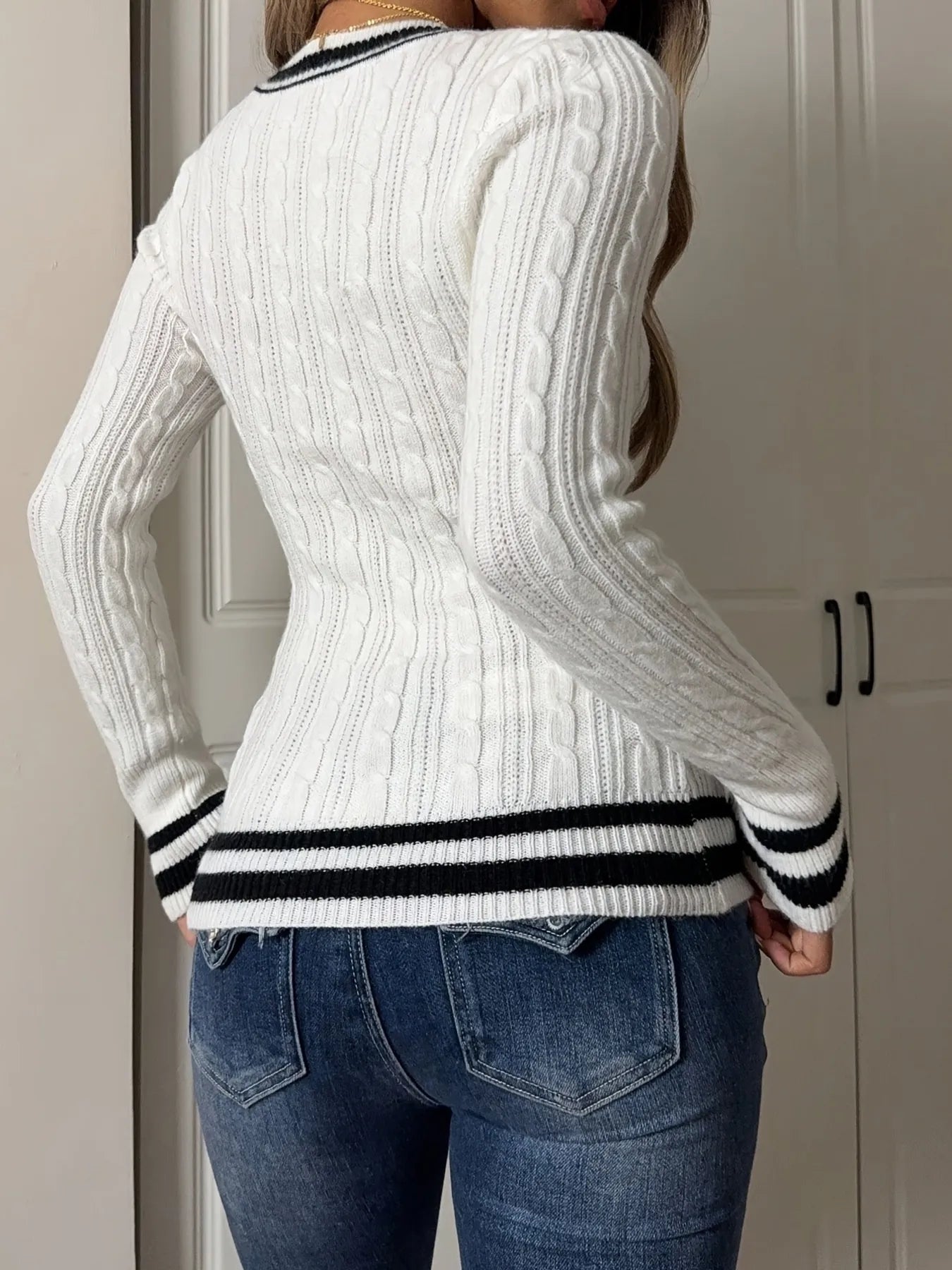 Back view of Cable Knit Long Sleeve Sweater showing full details