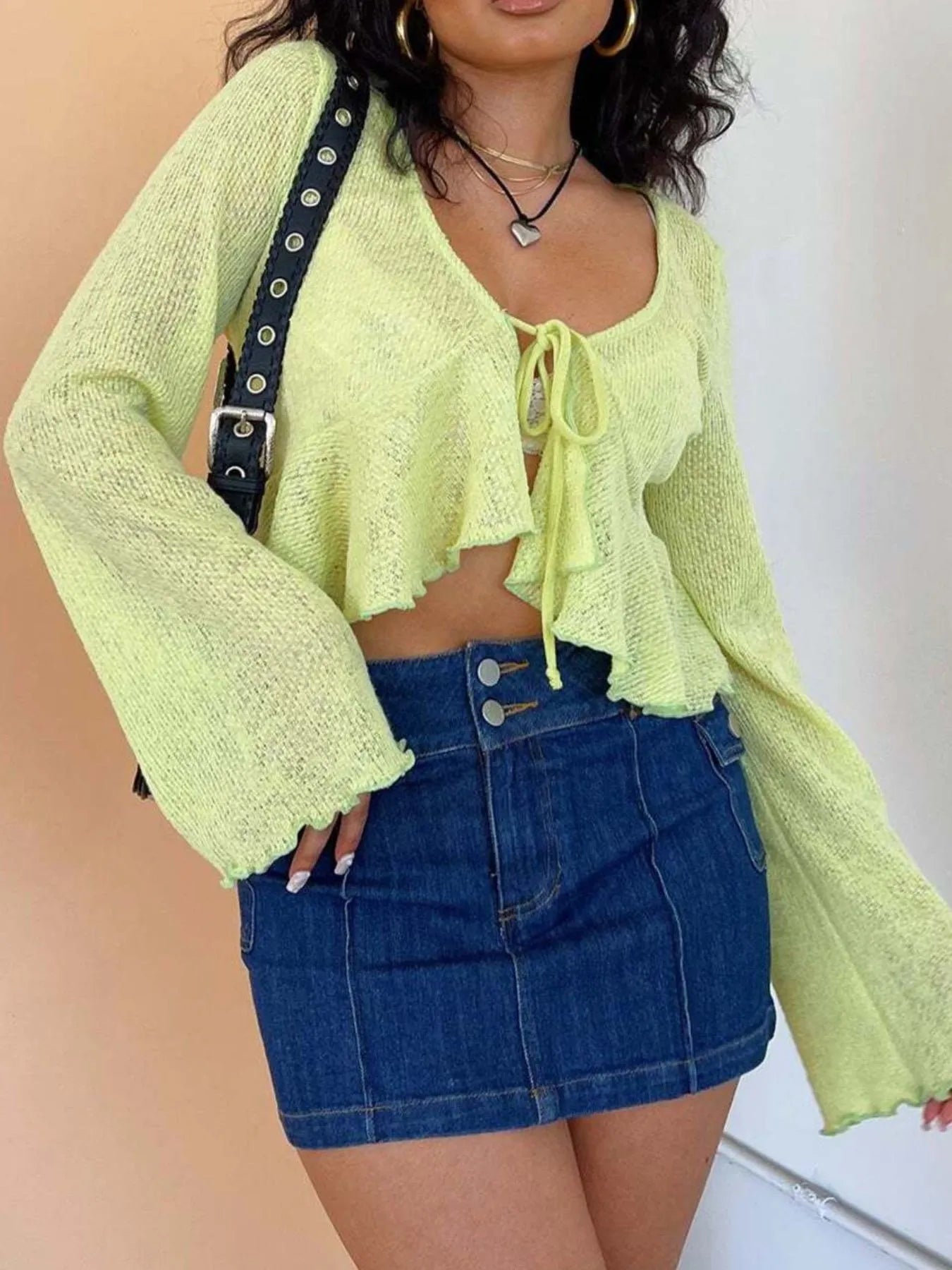 (Ruffled hem tie-front cropped cardigan side view)